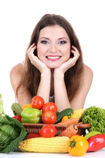 Bella donna con verdure sul tavolo isolata su bianco — Foto Stock