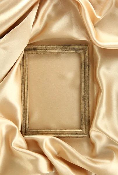 Empty frame on beautiful silk — Stock Photo, Image