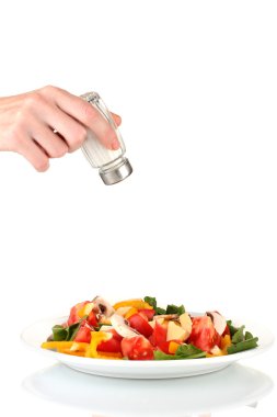el ekleyerek tuz tuz shaker üzerinde beyaz izole kullanarak