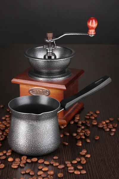 Coffee maker and coffee mill on brown table — Stock Photo, Image