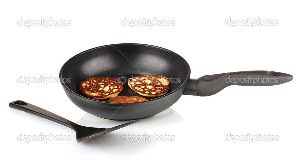 delicious sweet pancakes in frying pan isolated on white