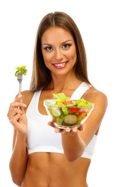 Mooie jonge vrouw met salade, geïsoleerd op wit — Stockfoto