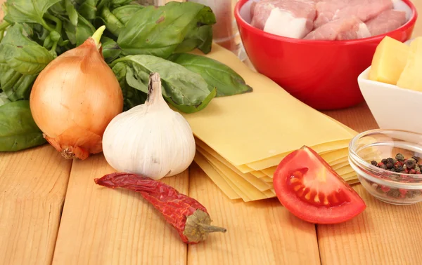 Lasagna ingredients on wooden background — Stock Photo, Image
