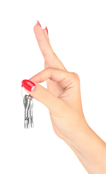 Mão com chaves isoladas em branco — Fotografia de Stock