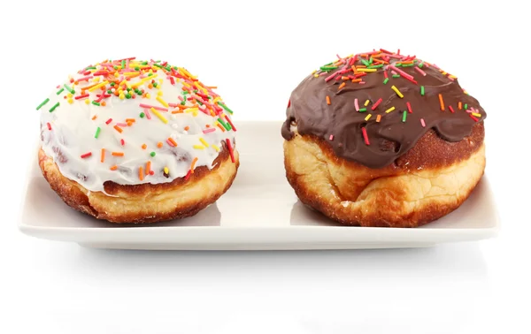 Smakelijke donuts geïsoleerd op wit — Stockfoto