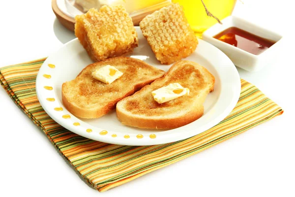Άσπρο ψωμί toastwith μέλι στο πιάτο, που απομονώνονται σε λευκό — Φωτογραφία Αρχείου