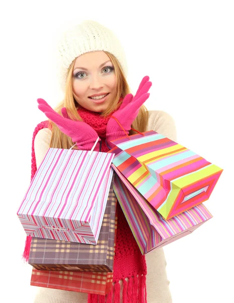 Attractive young woman woman with lot of shopping bags, isolated on white — Stock Photo, Image