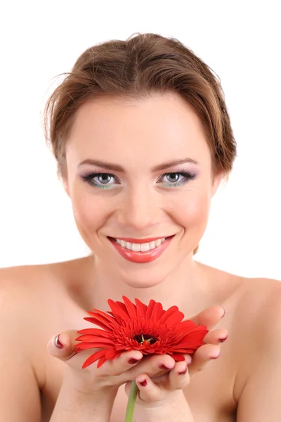 Mulher jovem bonita com maquiagem brilhante, segurando flor, isolada em branco — Fotografia de Stock