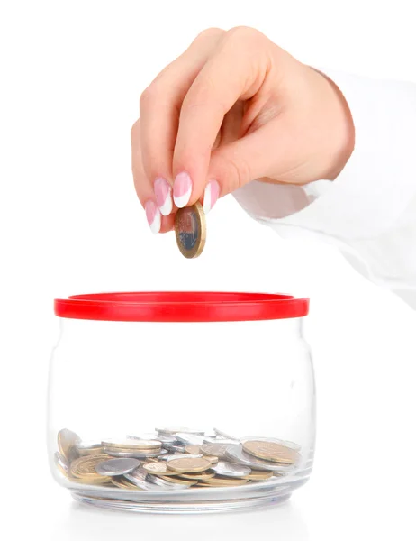 Woman hands with coins in glass jar isolated on white — Stock Photo, Image