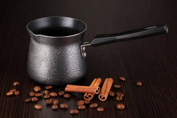 Coffee maker on brown table — Stock Photo, Image