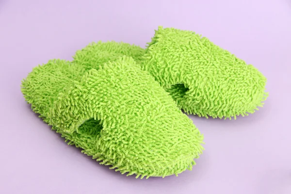 Bright slippers, on purple background — Stock Photo, Image
