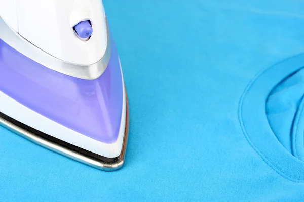 Ironing color textile, close up — Stock Photo, Image