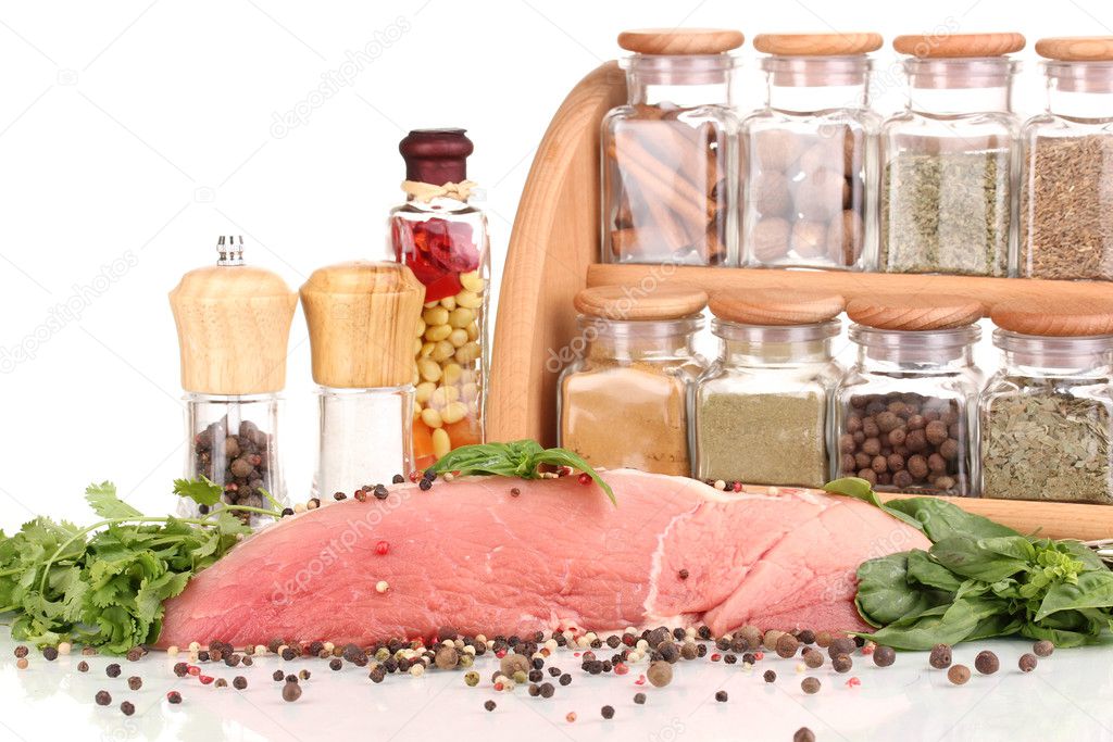A large piece of pork marinated with herbs and spices isolated on white