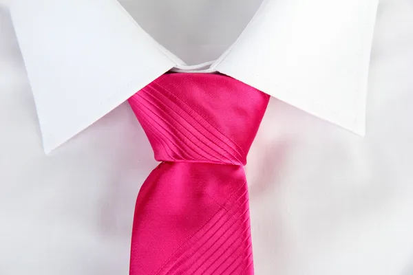 New white man's shirt with color tie on wooden background — Stock Photo, Image