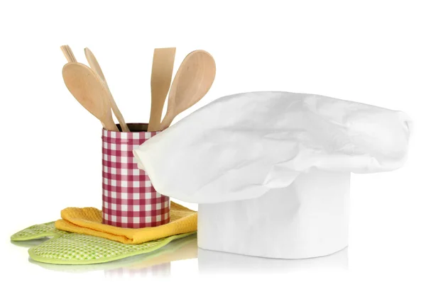 Chef's hat with kitchen towels, potholders and kitchenware isolated on white — Stock Photo, Image