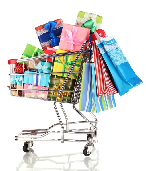 Christmas gifts and shopping in trolley isolated on white — Stock Photo, Image