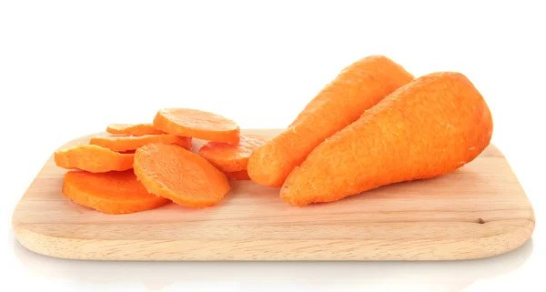 Carrots on cutting board isolated on white — Zdjęcie stockowe