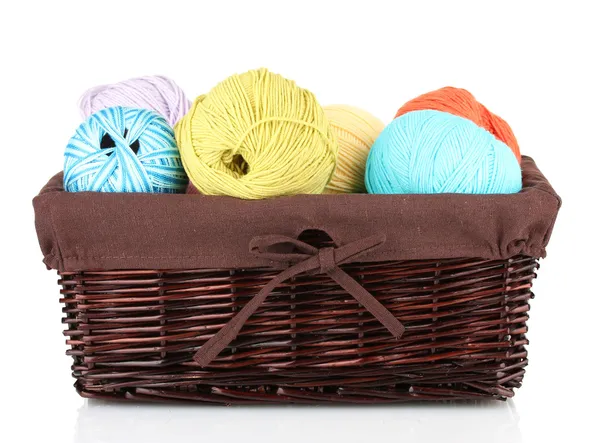 Colorful yarn balls in wicker basket isolated on white — Stock Photo, Image