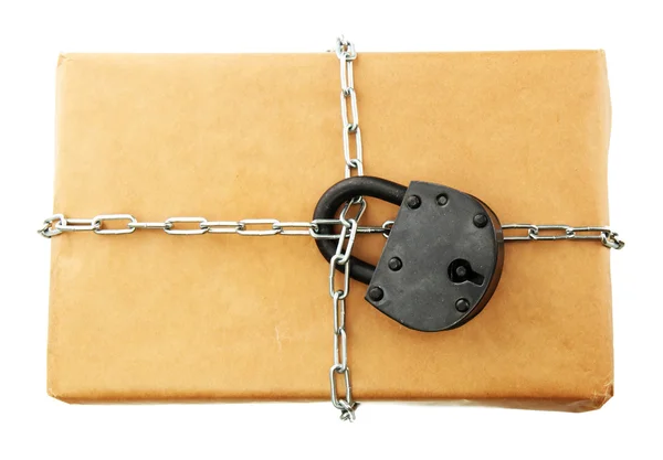 Parcel with chain and padlock, isolated on white — Stock Photo, Image