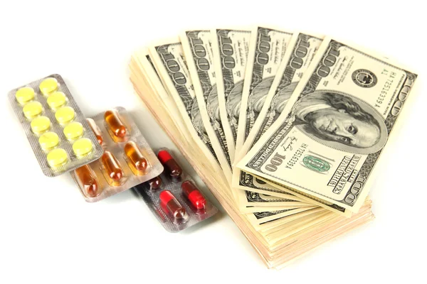 Pills and money isolated on white — Stock Photo, Image