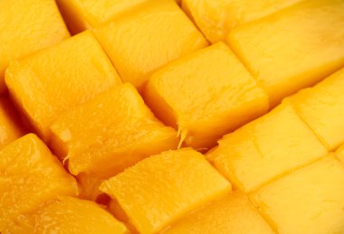 Olgun iştah açıcı mango yakın çekim arka plan