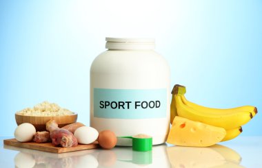 protein tozu ve gıda protein, mavi zemin üzerine kavanoz