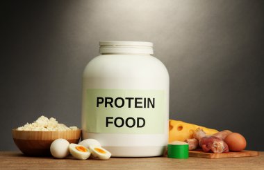 protein tozu ve gıda protein, gri arka plan üzerine kavanoz