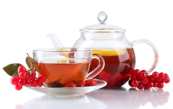 Glass teapot and cup with black viburnum tea isolated on white — Stock Photo, Image