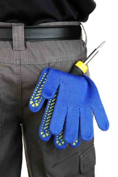 Перчатки и инструменты в заднем кармане крупным планом — стоковое фото