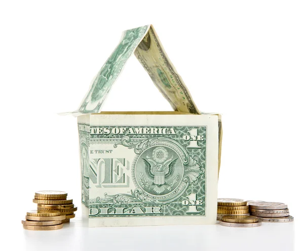 米ドルとユーロ硬貨、白で隔離されるの家 — ストック写真