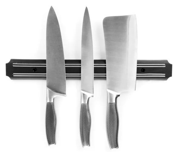 Set of knives on magnetic holder isolated on white — Stock Photo, Image