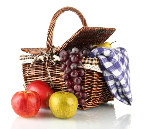 Picnic basket with fruits and blanket isolated on white — Stock Photo, Image