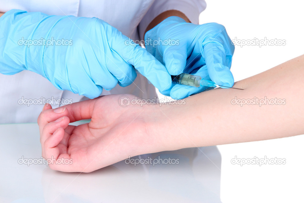 vaccine injection in hand isolated on white