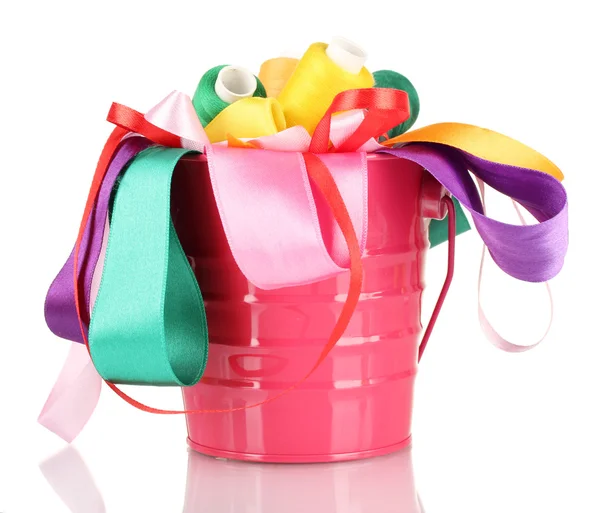 Color bucket with multicolor ribbons and thread isolated on white — Stock Photo, Image