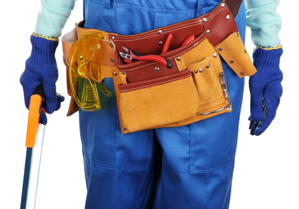 Male builder in blue overalls with saw isolated on white — Stock Photo, Image