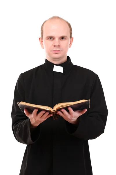 Young pastor with Bible, isolated on white — Stock Photo, Image