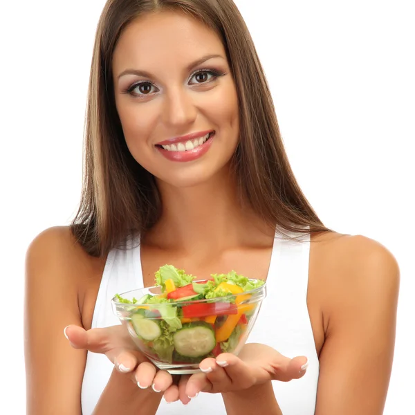 Bela jovem com salada, isolada em branco — Fotografia de Stock