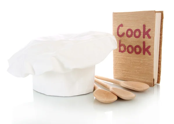 Sombrero de chef con cucharas y libro de cocina aislado en blanco —  Fotos de Stock