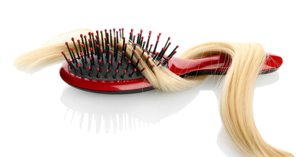 comb brush with hair, isolated on white