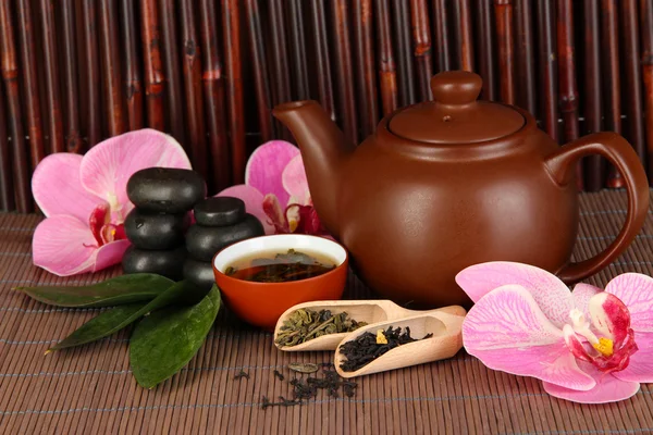 Chinese tea ceremony on bamboo table on bamboo background — Stock Photo, Image