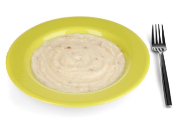 Yeşil plaka üzerinde beyaz izole patates püresi