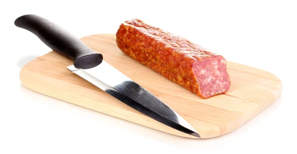 Tasty sausage on chopping board isolated on white — Stock Photo, Image