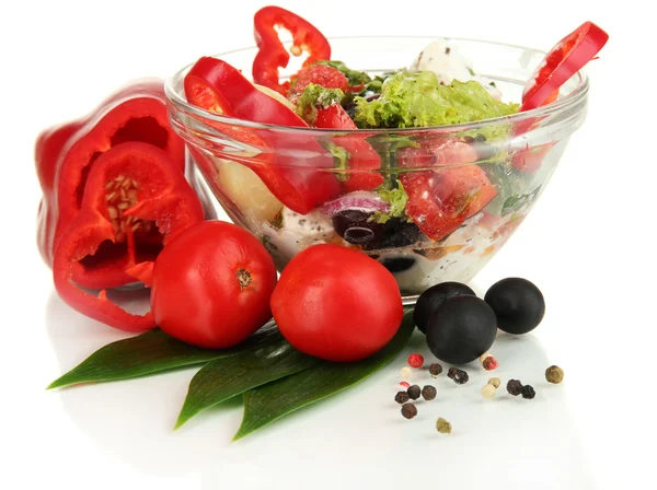 Fresh greek salad in glass bowl isolated on white — Stockfoto