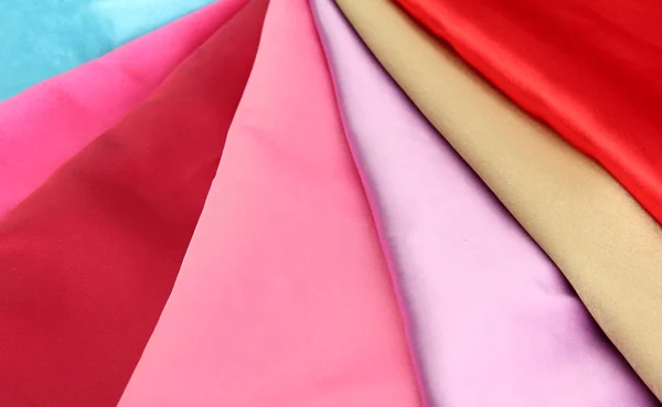Heap of cloth fabrics, close up — Stock Photo, Image