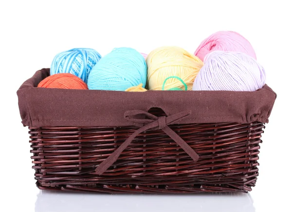 Colorful yarn balls in wicker basket isolated on white — Stock Photo, Image