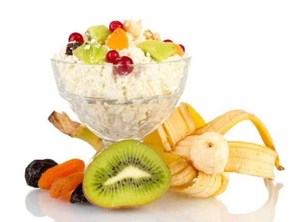 Cottage cheese in glass bowl with exotic fruits, isolated on white — Stock Photo, Image