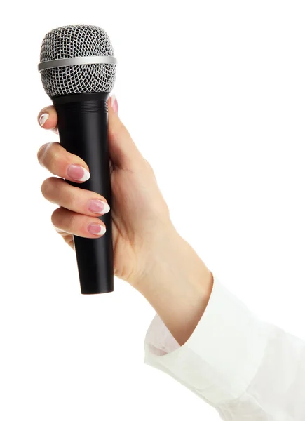 Γυναικείο χέρι με το μικρόφωνο που απομονώνονται σε λευκό — Φωτογραφία Αρχείου