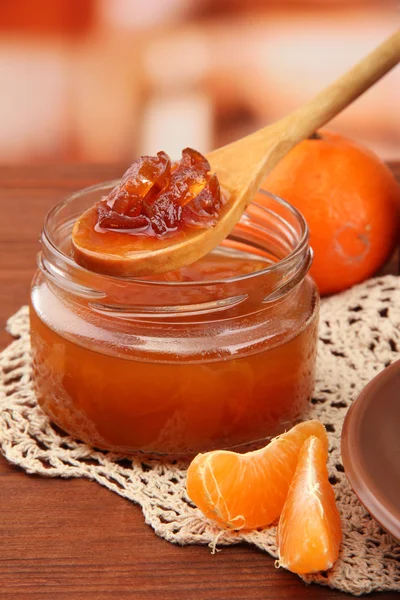 Tasty homemade mandarine jam, on wooden table — Stock Photo, Image