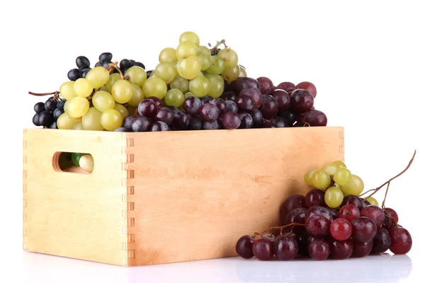 Assortment of ripe sweet grapes in wooden crate, isolated on white — Stock Photo, Image