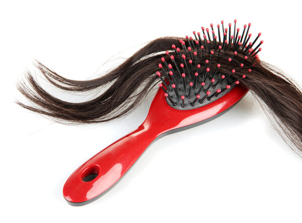 comb brush with hair, isolated on white